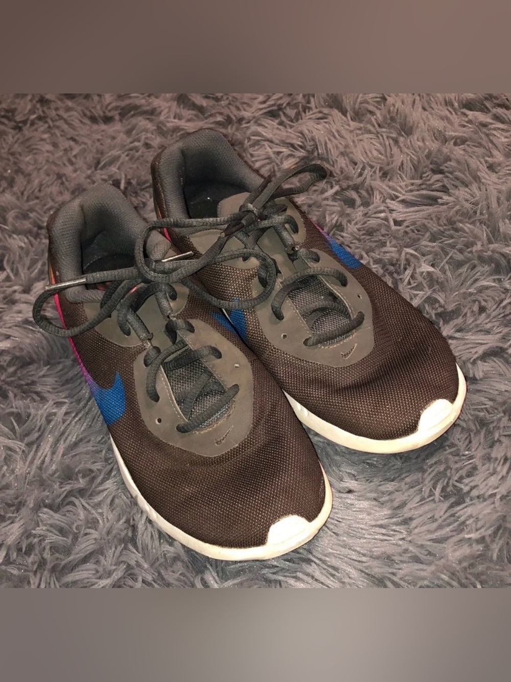 Well worn womens Nike Black Sneakers